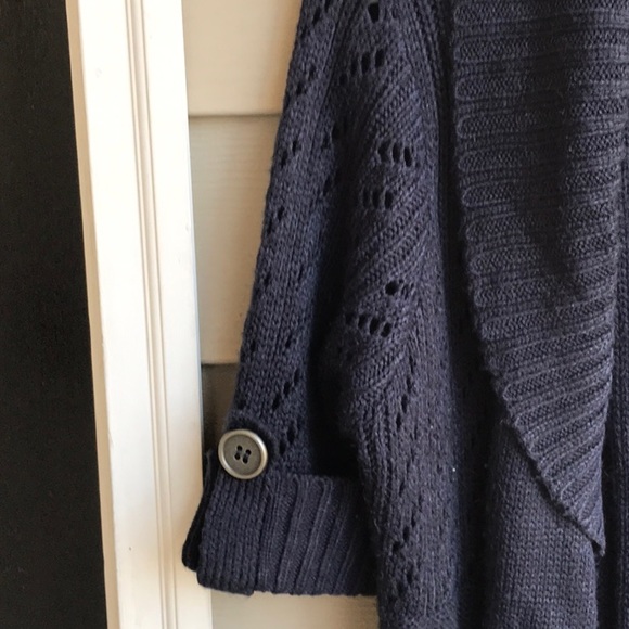 Go from winter to spring in this cute short sleeve navy blue cardigan. - Picture 4 of 8